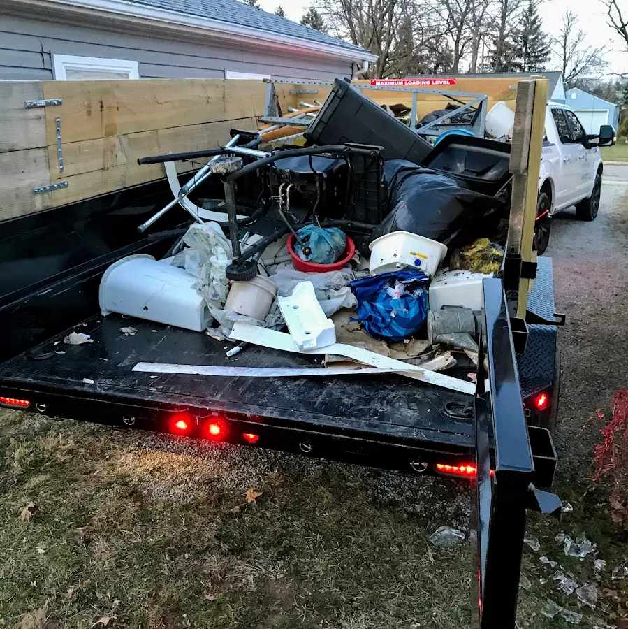 Roll-off dumpster delivered to a residential driveway in Maeser